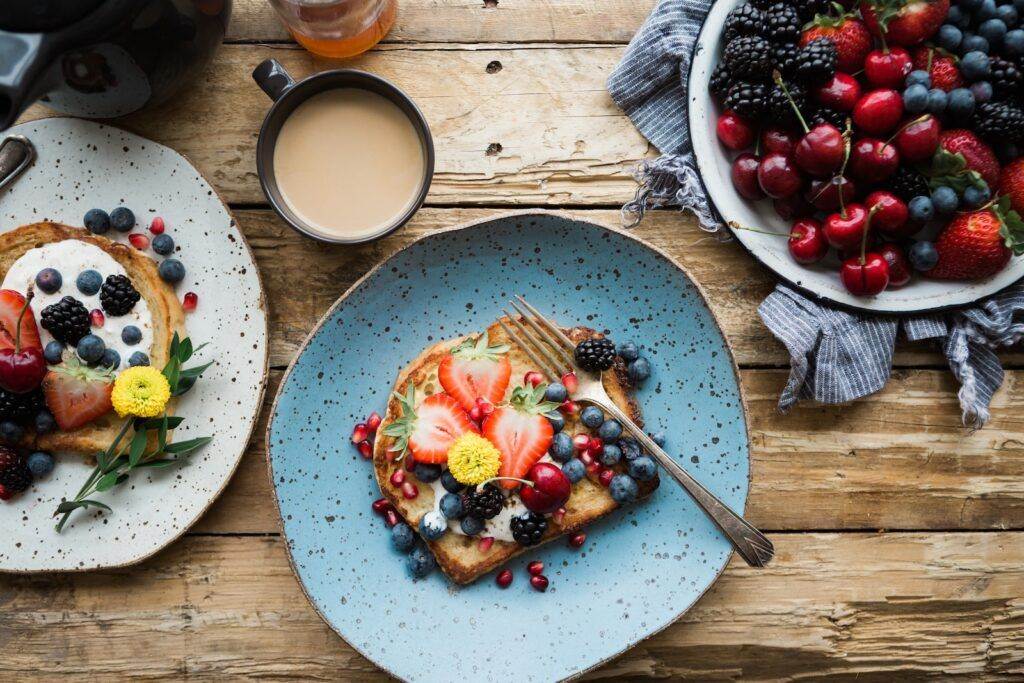 fruit sandwich on a blue ceramic plate