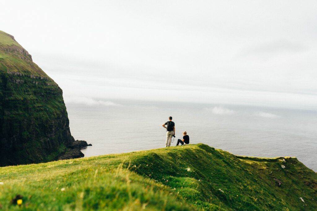 People by the Seaside in the Faroe Islands