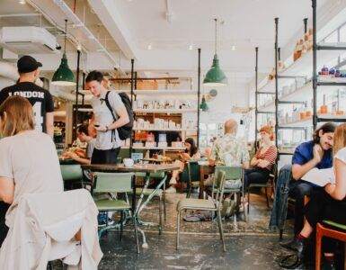 people eating inside of cafeteria during daytime