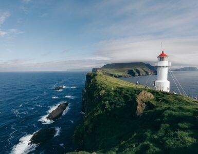 lighthouse near body of water