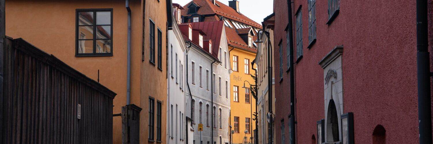 a narrow street with buildings on both sides