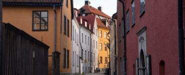 a narrow street with buildings on both sides