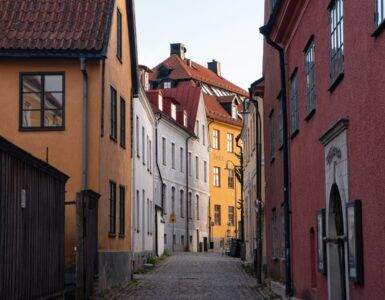 a narrow street with buildings on both sides