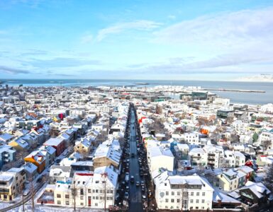 a view of a city with a lot of snow on the ground